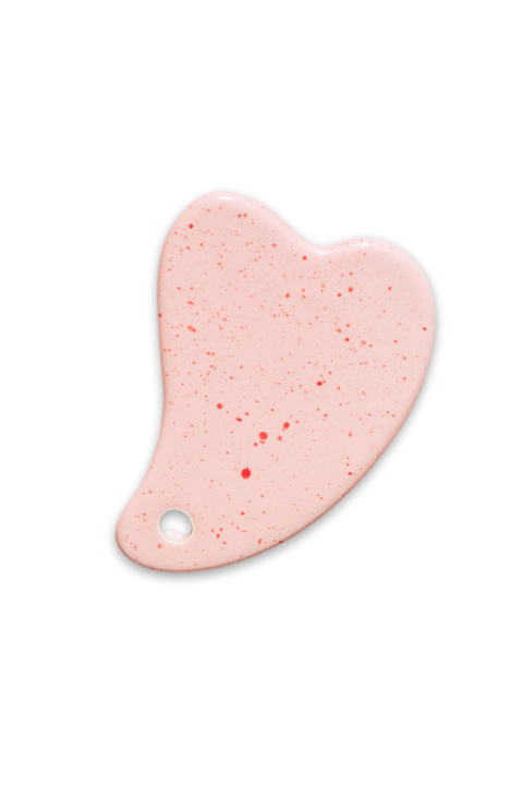 Różowy kamień gua sha